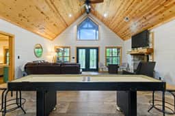 Hochatown Cabin with Hot Tub, Fire Pit & Pets | Between The Pines Broken Bow - Image 4