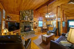 Red Fox Den Cabin | Pet-Friendly Broken Bow Cabin with Hot Tub, Fire Pit, Creek & Covered Deck - Image 4